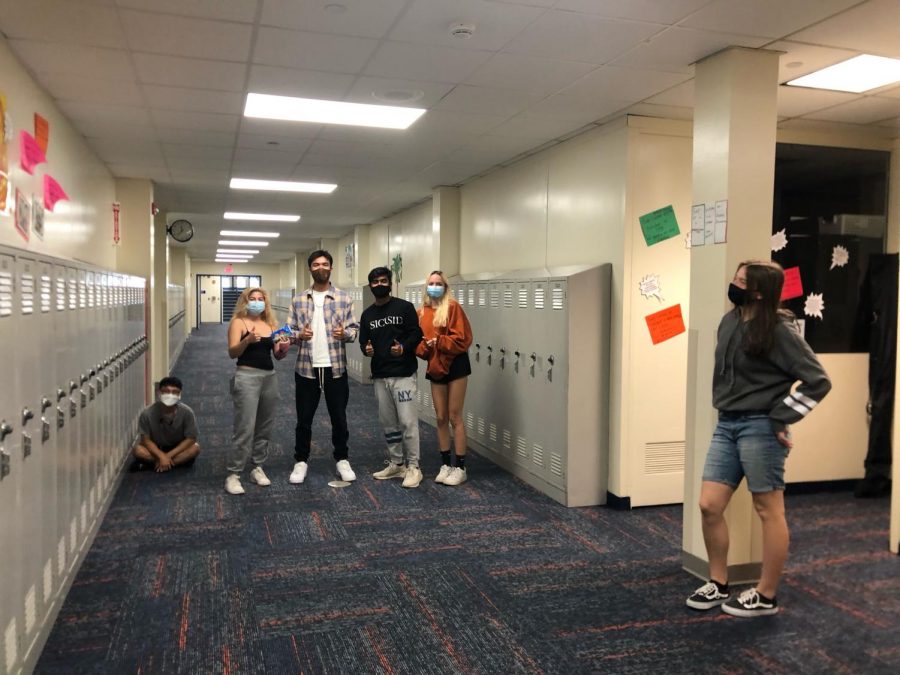 Samuel Ham, Evelyn Simon, Eric
Pelinski, Rahil Patel, Maia Roufis, Gabija Fedaravicius spend time chatting during a break, happy to be able to connect in person.