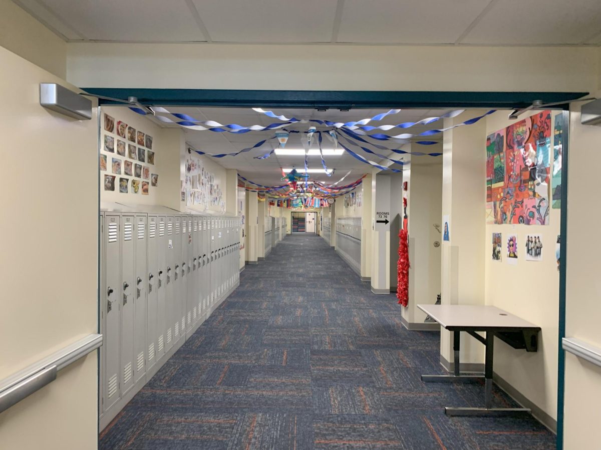  An HEHS hallway awaits a sea of students, who soon will gather to reconnect with friends and make the trek to their next classes.