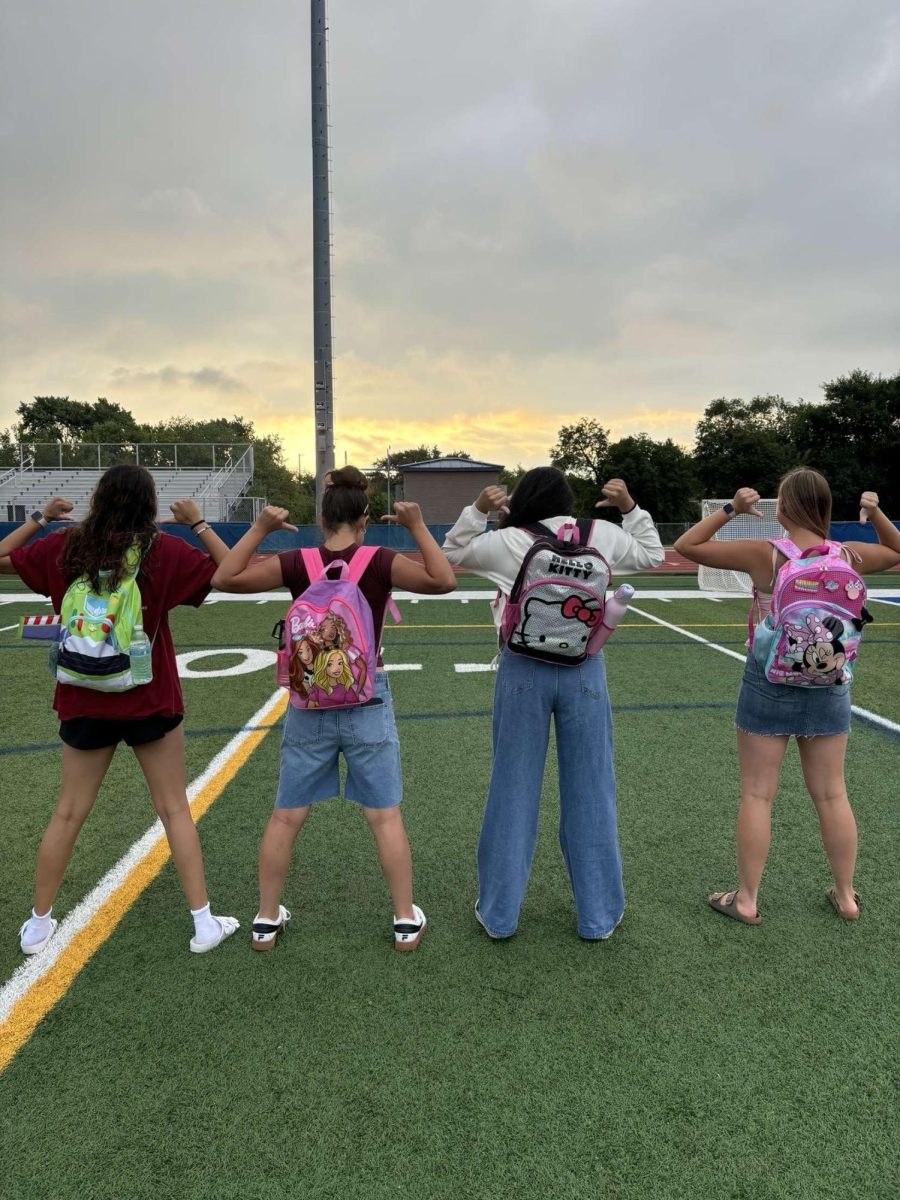 (left to right) Rudra Patel, Olivia Pelayo, Hiba Ali, and Cailin Hopkins show off their backpacks with pride. 